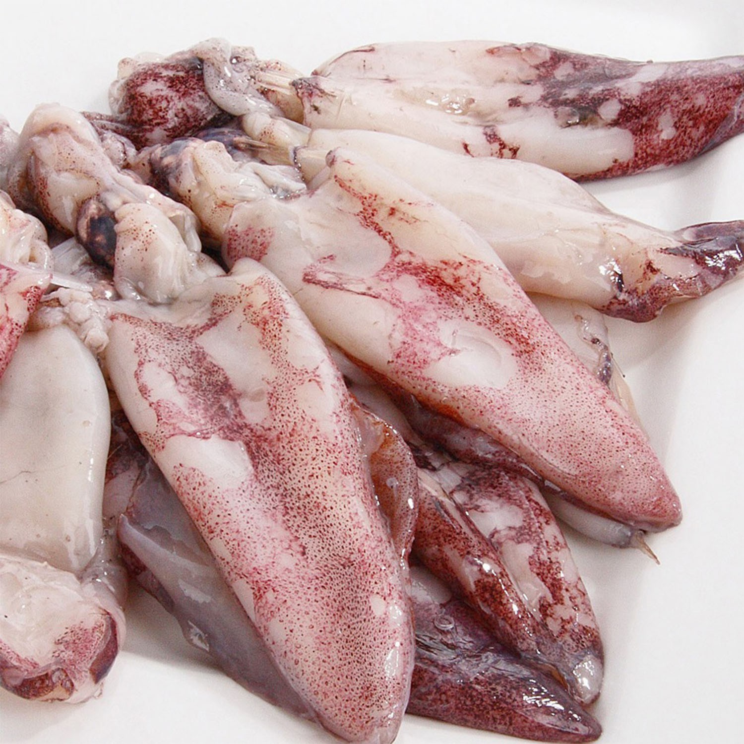 Кальмар тушка, свежемороженый, неочищенный 1кг